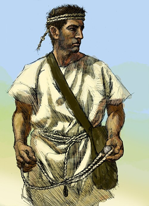 Illustration of an ancient Balearic slinger armed with a sling and pouch of projectiles, representing mercenary troops used in Punic War armies.