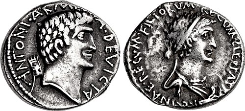 Silver denarius of Mark Antony and Cleopatra from 34 BC, showing busts of Cleopatra and Mark Antony on opposite sides of the coin.