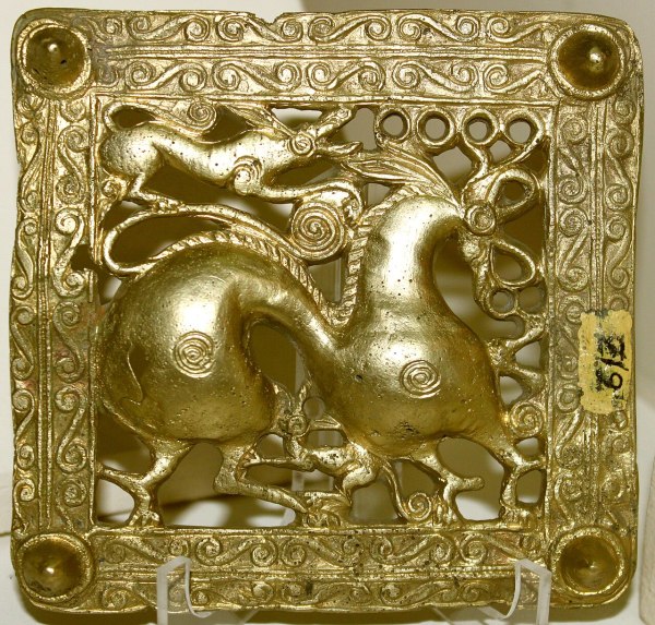 Gold Scythian belt title from Mingachevir, Azerbaijan, an ornate metalwork artifact showing animal‑style decoration typical of Scythian craftsmanship during the early first millennium BCE.