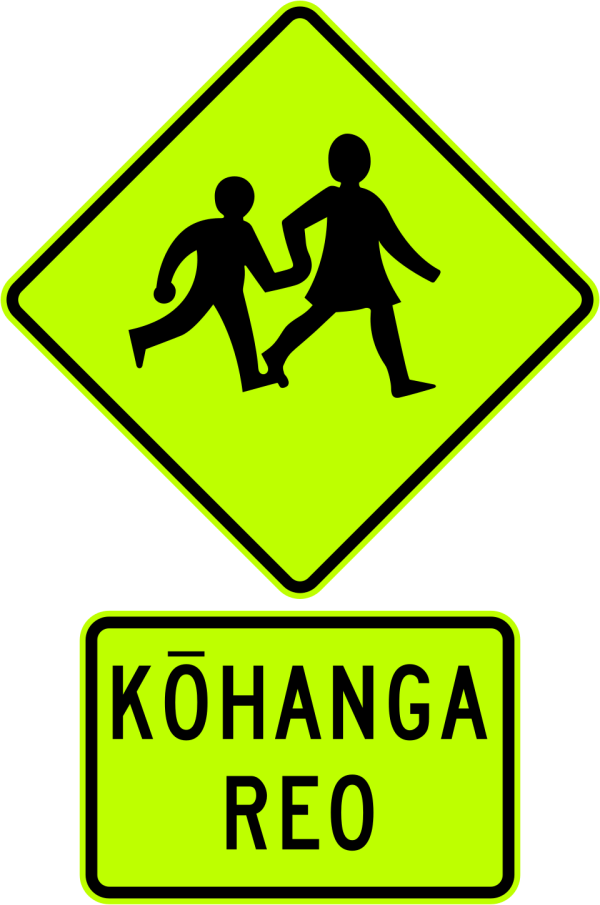 New Zealand bilingual road sign showing directions to Ōtara and Manukau, illustrating Māori language presence in public signage.