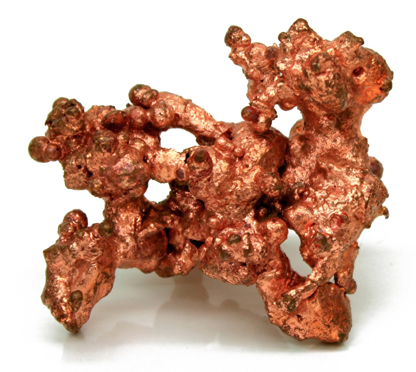 Close‑up macro photograph of a native copper specimen showing the natural metallic texture of copper metal.